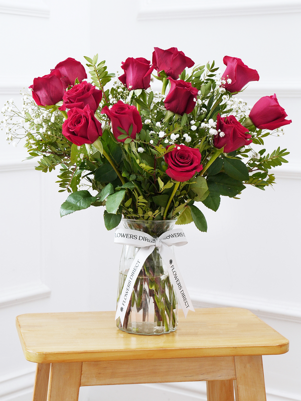 12 Red roses with a vase