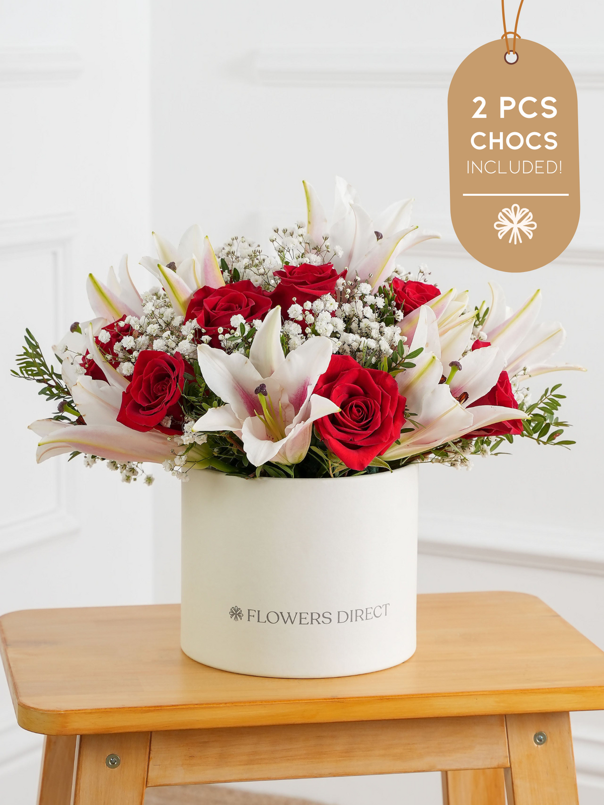 Red roses and Pink lily Hatbox 2 Pcs Chocs included!