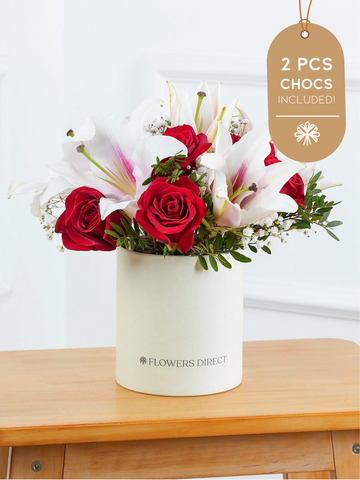 Red roses and Pink lily Hatbox 2 Pcs Chocs included!