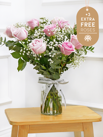 12 Pink roses with a vase with 3 Extra Free Roses