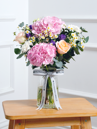 Sweet Pastel Vase – Brighten up any space with our 'Sweet Pastel' arrangement, featuring soft pink hydrangeas, peach...