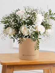 White Roses Hatbox – Celebrate any special occasion with our stunning 12 white roses hatbox, elegantly complemented by gypsophillia and...