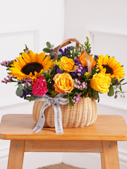 Colour Burst Basket – Brighten up any room with our Colour Burst basket arrangement, featuring stunning sunflowers, cerise...