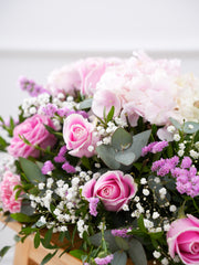 Sweetheart Spray – Offering solace through delicate blooms, the dainty "Sweetheart" arrangement features hydrangea, pink roses, statice, carnations,...