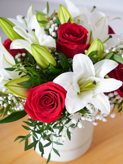 Red Roses and White Lily - Hatbox – Our Red Roses and White Lily Hatbox is a bold and striking floral arrangement, featuring...