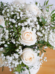 Anniversary White Roses - Hatbox Gift Set – Celebrate any special occasion with our stunning 12 white roses hatbox, elegantly complemented by gypsophillia and...