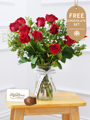Anniversary 12 Long Stem Red Roses - Vase with Chocolate Set – Nothing expresses love quite like a dozen of the finest, large headed red roses . Our skilled...