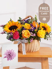 Colour Burst Basket with Free Occasion Card – Brighten up any room with our Colour Burst basket arrangement, featuring stunning sunflowers, cerise...