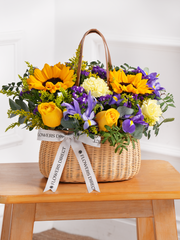 Iris Bliss Basket – The Iris Bliss – Basket is a cheerful mix of Blue Iris, Sunflowers, Yellow...