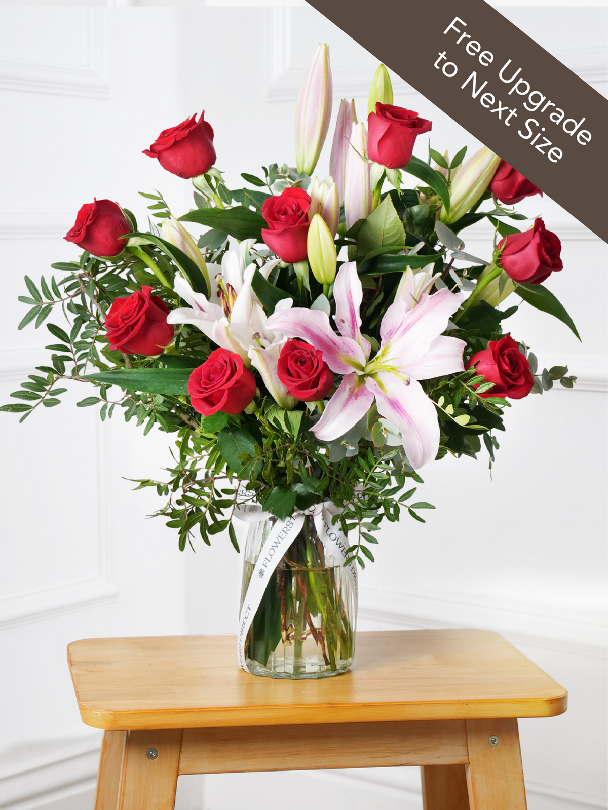 Red Roses and Pink Lily - Vase with Free Upgrade to Next Size