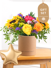 Colour Burst Hatbox Gift Set – Brighten up any room with our "Colour Burst" arrangement, featuring stunning sunflowers, cerise carnations,...