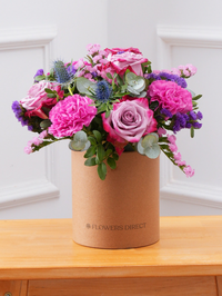 Purple Majesty - Hatbox –  Experience the regal and majestic beauty of our "Purple Majesty" arrangement, featuring luxurious deep...