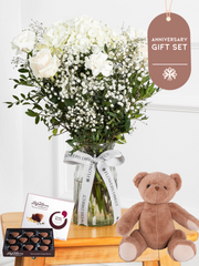 Anniversary Pure Bliss - Vase Gift Set – Indulge in the pure and serene beauty of our "Pure Bliss" arrangement, featuring pristine...