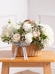 Sympathy Pure Bliss Basket – A graceful composition of white roses, carnations, and hydrangeas, artfully arranged in a rustic...
