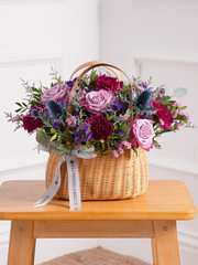 Sympathy Purple Majesty Basket – This heartfelt arrangement combines the ethereal beauty of deep purple roses, soothing blue statice,...