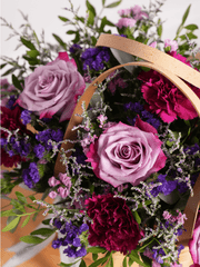 Sympathy Purple Majesty Basket – This heartfelt arrangement combines the ethereal beauty of deep purple roses, soothing blue statice,...