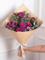 Purple Bunch! – Elevate any moment with this gorgeous mix of Purple Statice, Pink Statice, Carnations, and...