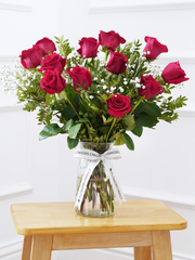 12 Red roses with a vase – Elevate the essence of romance with our exquisite bouquet of 12 Long Stem Red...