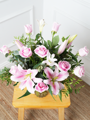 Pink Roses and Pink Lily Vase Free Upgrade –  This is a very elegant bouquet, featuring 6 large headed Pink roses with 2...