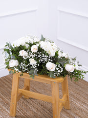 Pure Bliss Spray – The Pure Bliss Spray is a graceful and elegant display of flowers, carefully crafted to...