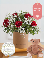Anniversary Red Roses - Hatbox Gift Set –  Celebrate any special occasion with our stunning red roses hatbox, elegantly complemented by gypsophillia and...