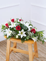 Red Roses and White Lily Spray – This funeral wreath, adorned with graceful red roses, elegant white lilies, delicate gypsophila, accompanied...