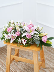 Pink Roses and Pink Lily Spray – This captivating funeral wreath gracefully combines the delicate beauty of pink roses and pink...