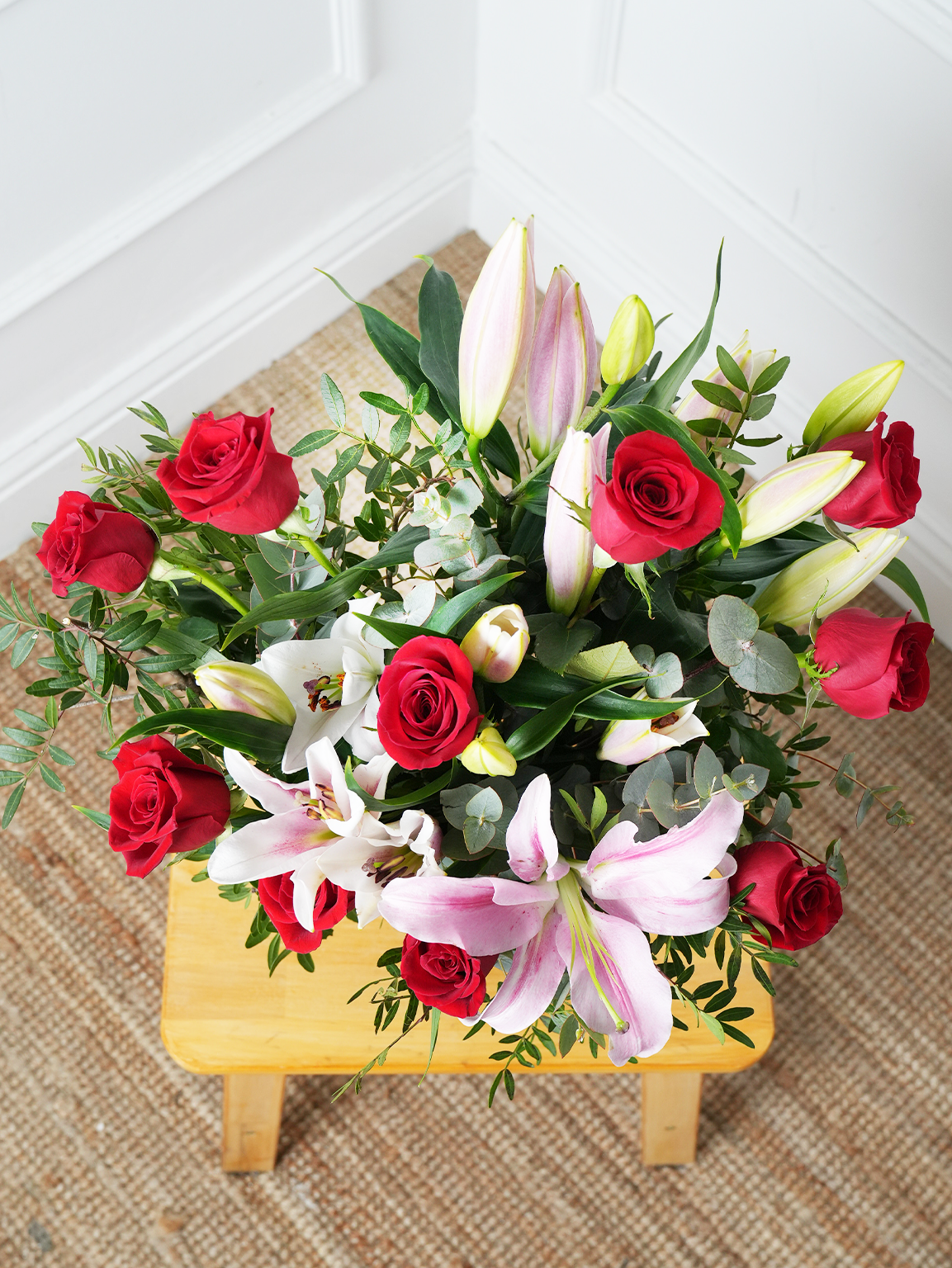 Red Roses and Pink Lily - Vase with Free Upgrade to Next Size