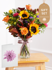 Autumn Charm Vase Gift Set – Embrace the season's warmth with our Autumn Charm vase. Featuring yellow and orange roses,...