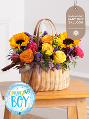 Baby Boy Autumn Charm - Basket  (Complimentary Baby Boy Balloon) – The Baby Boy Autumn Charm Basket is a vibrant and joyous arrangement featuring a delightful...