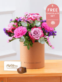 Purple Majesty - Hatbox with Free Chocolate Set –  Experience the regal and majestic beauty of our "Purple Majesty" arrangement, featuring luxurious deep...