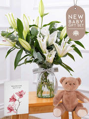 New Baby White Lily - Vase Gift Set – Welcome the newest addition with our New Baby White Lily arrangement, featuring elegant white...