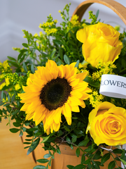Sunflower Basket –  Brighten any day with our radiant Sunny Day floral arrangement, lovingly nestled in a...