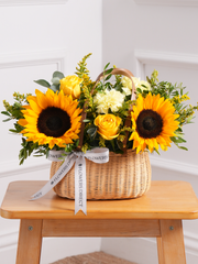Sunflower Basket –  Brighten any day with our radiant Sunny Day floral arrangement, lovingly nestled in a...
