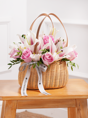 Pink Roses and Pink Lily Basket –  Our Pink Roses and Pink Lily Basket is a sophisticated and timeless way to express...