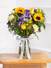 Iris Bliss Vase – Perfect for any occasion, Iris Bliss blends timeless elegance with vibrant charm. Featuring Bleu...