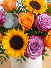Sunflower Hatbox – Give the gift of pure joy with this vibrant Sunny Day Hatbox floral arrangement! The golden...