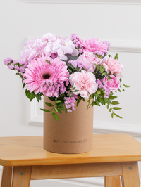 Sweetheart - Hatbox – Express your love and affection with our "Sweetheart" arrangement, featuring delicate pink hydrangeas, vibrant...