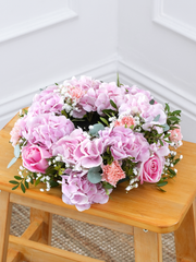 Sweetheart Wreath – This exquisite funeral wreath, adorned with delicate pink hydrangeas, roses, statice, carnations, gypsophila, pistach,...