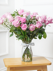 24 Long Stem Pink Roses - Vase –  Indulge in the timeless elegance of our 24 Long Stem Pink Roses with Vase....