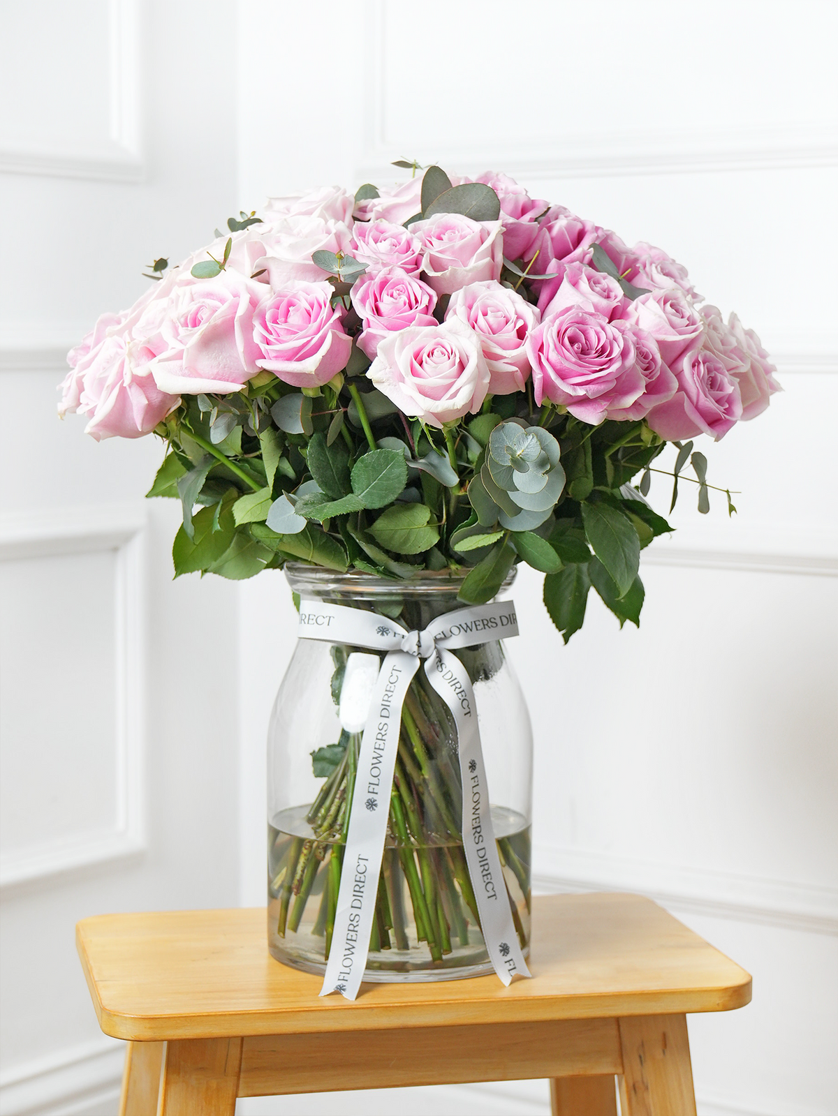 Women&#39;s Day 50 Long Stem Pink Roses - Vase