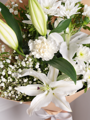 White Bunch! – Transform any event with this sophisticated blend of White Carnations, Lilies, Gypsophila, and Chrysant...
