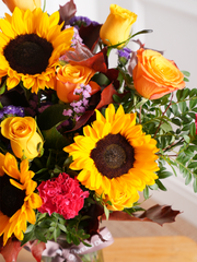 Birthday Autumn Charm - Vase (Complimentary Birthday Balloon) –  Brighten up their special day with our Autumn Charm - Vase arrangement, featuring stunning sunflowers,...