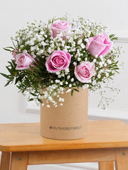 Pink Roses Hatbox –  Celebrate any special occasion with our 12 Pink Roses Hatbox arrangement, expertly crafted with delicate...