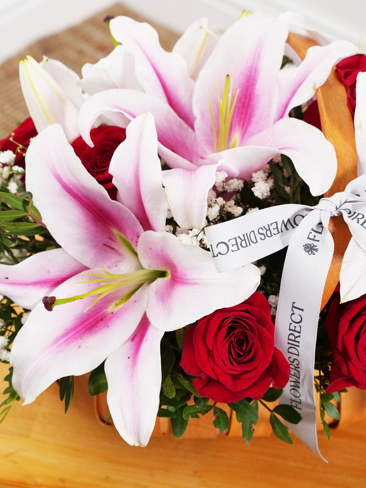 Women&#39;s Day Red Roses and Pink Lily - Basket