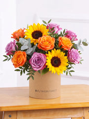 Sunflower Hatbox – Give the gift of pure joy with this vibrant Sunflwoer Hatbox floral arrangement! The...