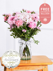 Anniversary Sweetheart - Vase with Free Anniversary Balloon – Express your love and affection with our "Sweetheart" arrangement, featuring delicate pink hydrangeas, pink...