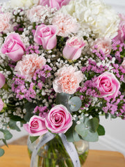 Heaven's Way in a vase – Express your love and affection with our "Heaven's Way" arrangement, featuring delicate hydrangeas, soft...