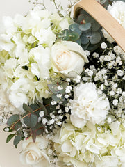 Pure Bliss Basket –  Indulge in the pure and serene beauty of our "Pure Bliss" arrangement, featuring pristine...